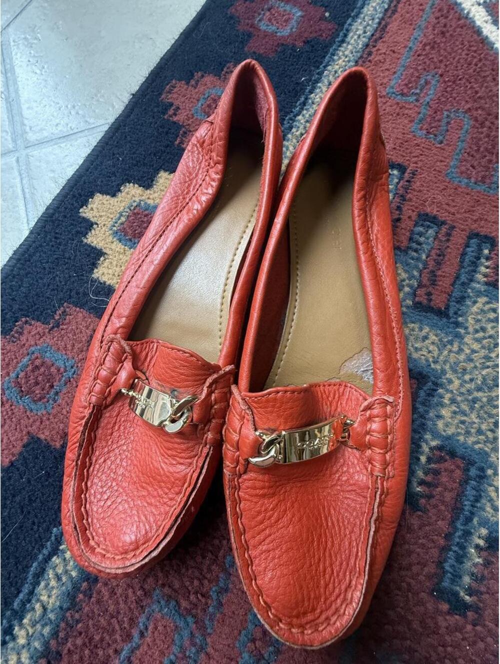 Coach orange leather loafers with gold buckle detail #preppy #buckle
